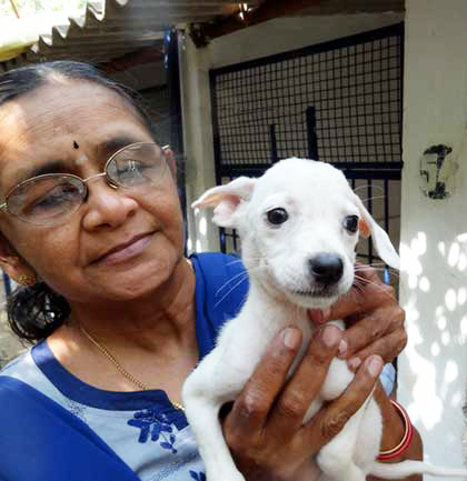 Ms. Mallika Buddhiraju VSPCA -woman_holding_dog_420